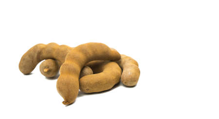 Tamarind - Sweet ripe tamarind isolated on white background with clipping path.の写真素材