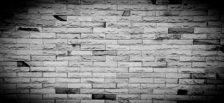 Black and white brick wall for background with copy space for textの写真素材
