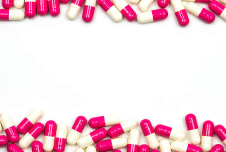 Colorful of antibiotic capsules pills isolated on white background with copy space. Drug resistance, antibiotic drug use with reasonable, health policy and health insurance concept.の写真素材