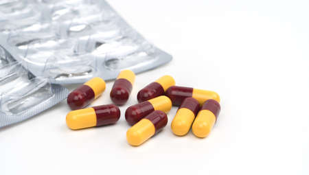 Pile of used blister pack and capsule pills on white background with copy spaceの写真素材