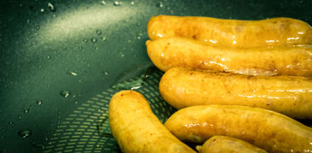 Fried pork sausage in a panの写真素材