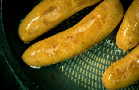 Fried pork sausage in a panの写真素材