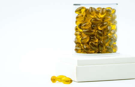Rice bran oil extract capsule in luxury plastic box packaging on white backgroundの写真素材