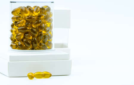 Rice bran oil extract capsule in luxury plastic box packaging on white backgroundの写真素材