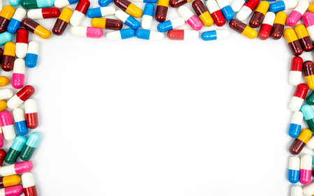 Colorful of antibiotic capsules pills isolated on white background with copy space. Drug resistance concept. Antibiotics drug use with reasonable and global healthcare concept.の写真素材