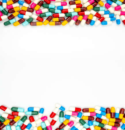 Colorful of antibiotic capsules pills isolated on white background with copy space. Drug resistance...