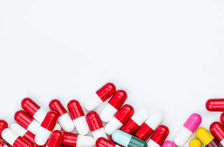 Colorful of antibiotic capsules pills isolated on white background with copy space. Drug resistance concept. Antibiotics drug use with reasonable and global healthcare concept.の写真素材