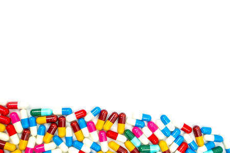 Colorful of antibiotic capsules pills isolated on white background with copy space. Drug resistance concept. Antibiotics drug use with reasonable and global healthcare concept.の写真素材