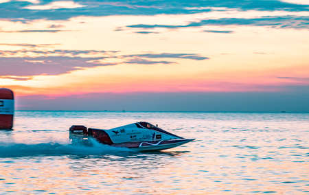 CHONBURI, THAILAND-NOVEMBER 25, 2017 :  boat with beautiful sky and sea with sunset in Bangsaen Power Boat 2017 at Bangsaen beach in Thailandのeditorial素材