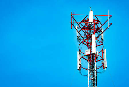 Telecommunication tower with clear blue sky backgroundの写真素材