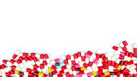 Colorful of antibiotic capsules pills isolated on white background with copy space. Drug resistance concept. Antibiotics drug use with reasonable and global healthcare concept.の写真素材