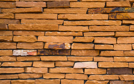 Orange brick wall texture background with space for textの写真素材