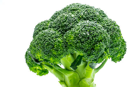 Macro shot detail of Green broccoli (Brassica oleracea). Vegetables natural source of betacarotene, vitamin c, vitamin k, fiber food, folate. Fresh broccoli cabbage isolated on white background.の写真素材