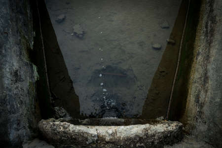 Top view of waste water flows in to the riverの写真素材
