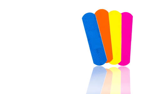 Macro shot detail of first aid dressing with non-stick pad for quick wound healing. Sterile wound dressing with bright color is easy to detect in food manufacturing industryの写真素材