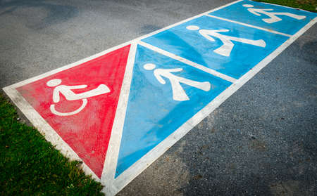 Traffic sign paint on asphalt road for wheelchair or pedestrian walkの写真素材