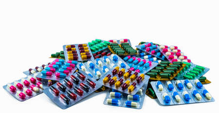 Colorful of antibiotic capsule pills isolated in blister pack isolated on white background with copy...