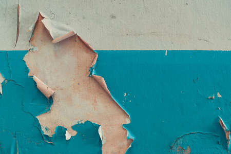 Old white and blue color peeling paint cement walls. Old and dirty concrete wall texture background...