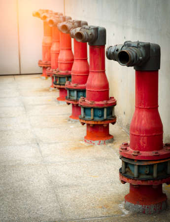 Fire safety pump on cement floor of concrete building. Deluge system of firefighting system....