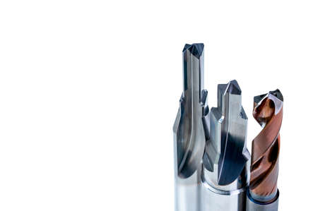 Special tools isolated on white background. Made to order special tools. Coated step drill and...