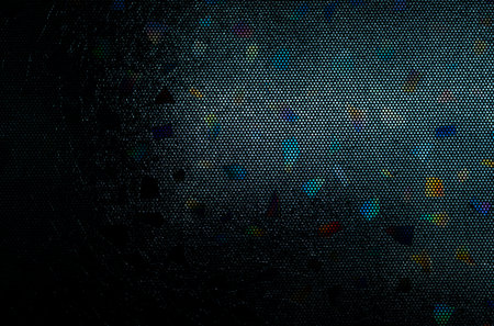 Stained glass mosaic abstract background. Stained glass window texture. Pattern of irregular glass on dark background. Art work for interior design. Craft material. Blue, purple and orange glass.の写真素材