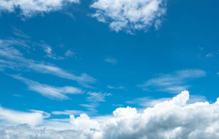 Beautiful blue sky and white cumulus clouds abstract background. Cloudscape background. Blue sky and fluffy white clouds on sunny day. Nature weather. Bright day sky for happy day background.の写真素材