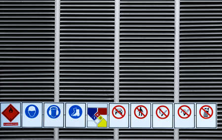 Warning sign chemical storage area installed at chemical storage room wall of factory.の写真素材