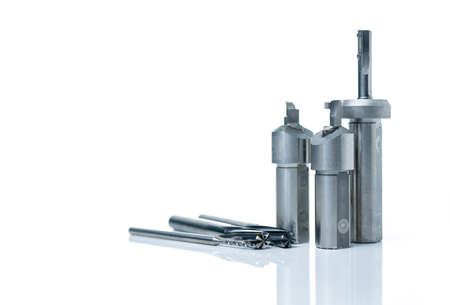 Special tools isolated on white background. Made to order special tools. Coated step drill and...