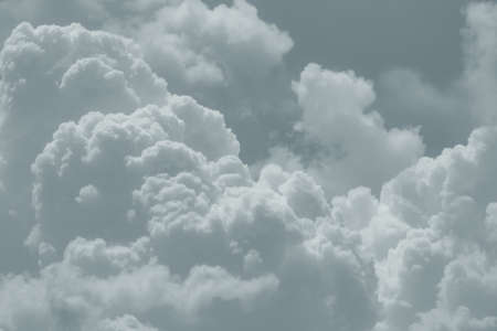 White fluffy clouds on sky. Soft touch feeling like cotton. White puffy cloudscape. Beauty in...