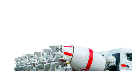 Closeup cement mixer truck isolated on white background. Concrete mixing transport truck. Cement mixer truck dealership. Concrete transport equipment. Cement delivery lorry. Construction industry.の写真素材