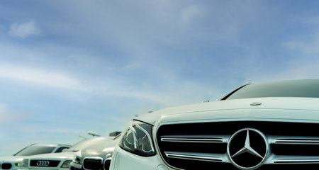 BANGKOK, THAILAND-JUNE 4, 2021 : Mercedes Benz car. Closeup logo and grille of Mercedes Benz. Product of German Company Daimler AG. Luxury car parked at car parking lot. Car dealership concept.のeditorial素材