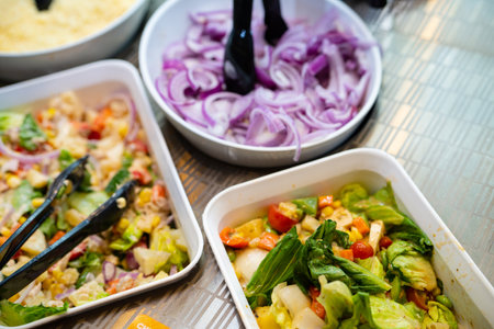 Salad bar. Salad buffet at restaurant. Fresh salad bar buffet for lunch. Healthy eating. Vegetable...