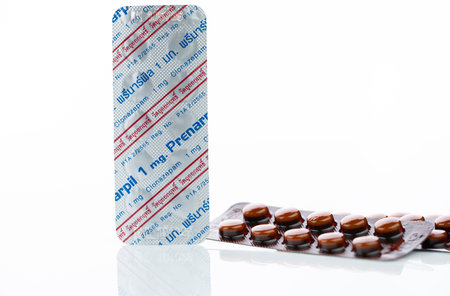 CHONBURI, THAILAND-JULY 11, 2023: Prenarpil round tablet pills and blister pack. Clonazepam used to treat seizures, panic disorder, anxiety disorders. Benzodiazepines drug. Mental illness medication.のeditorial素材