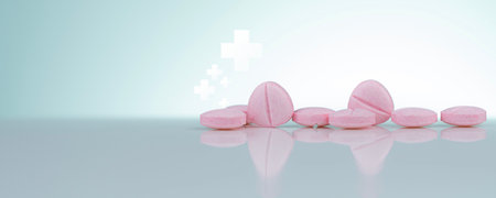 Pink tablets pills on white background. Health and medical care concept. Pharmacy banner. Prescription drug. Pharmaceutical industry. Medical center banner. Vitamins, minerals and supplements concept.の写真素材