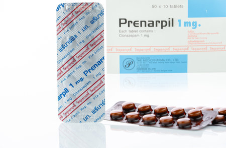 CHONBURI, THAILAND-JULY 11, 2023: Prenarpil tablet pills in brown blister pack. Clonazepam used to treat seizures, panic disorder, anxiety disorders. Benzodiazepines drug. Mental illness medication.のeditorial素材