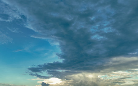 Beautiful blue sky and cumulus clouds abstract background. Cloudscape background. Blue sky and fluffy clouds. World Ozone Day. Ozone layer. Overcast clouds. Peaceful and tranquil. Dramatic sky.の写真素材