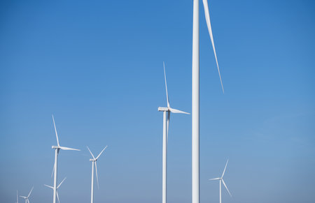 Wind energy. Wind power. Sustainable, renewable energy. Wind turbines generate electricity. Wind farm. Sustainable resources. Sustainable development. Green technology for energy sustainability.の写真素材
