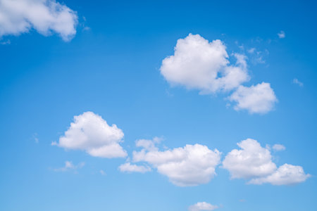 Beautiful blue sky and white cumulus clouds abstract background. Cloudscape background. Blue sky and fluffy white clouds on sunny days. Beautiful blue sky. World Ozone Day. Ozone layer. Summer sky.の写真素材