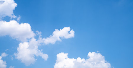 Beautiful blue sky and white cumulus clouds abstract background. Cloudscape background. Blue sky and fluffy white clouds on sunny days. Beautiful blue sky. World Ozone Day. Ozone layer. Summer sky.の写真素材