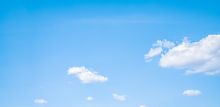 Beautiful blue sky and white cumulus clouds abstract background. Cloudscape background. Blue sky and fluffy white clouds on sunny days. Beautiful blue sky. World Ozone Day. Ozone layer. Summer sky.の写真素材