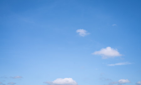 Beautiful blue sky and white cumulus clouds abstract background. Cloudscape background. Blue sky and fluffy white clouds on sunny days. Beautiful blue sky. World Ozone Day. Ozone layer. Summer sky.の写真素材
