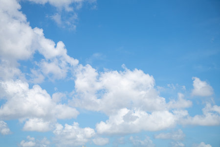 Beautiful blue sky and white cumulus clouds abstract background. Cloudscape background. Blue sky and fluffy white clouds on sunny days. Blue sky and daylight. World Ozone Day. Ozone layer. Summer sky.の写真素材