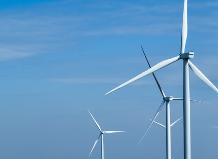 Wind energy and sustainable power generation with wind turbines, Eco-friendly solutions for renewable resources. Wind power farm and sustainable development of renewable energy, green technology.の写真素材