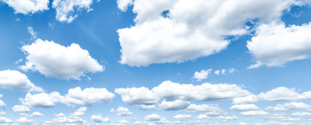 Beautiful blue sky and white cumulus clouds abstract background. Cloudscape background. Blue sky and fluffy white clouds on sunny days. Blue sky and daylight. World Ozone Day. Ozone layer. Summer sky.の写真素材