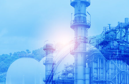 Gas turbine electrical power plant with industrial LNG storage tanks. Global energy production facility for electricity generation. Power plant infrastructure with liquefied natural gas containers.の写真素材