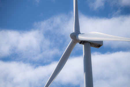 Wind energy and sustainable power generation with wind turbines, Eco-friendly solutions for renewable resources. Wind power farm and sustainable development of renewable energy, green technology.の写真素材