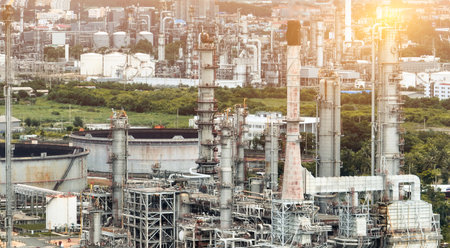Oil and gas refinery plant. Industrial pipelines and steel structures. Petroleum industry. Energy production. Industrial oil refinery and petrochemical plant. Infrastructure for energy and fuel.の写真素材