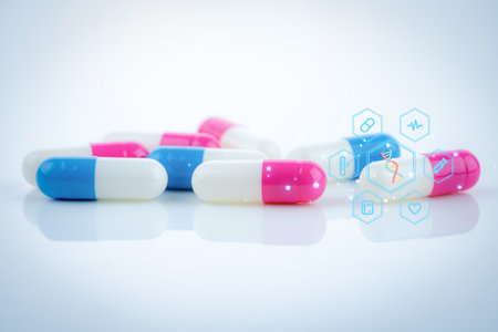 Pink-white and blue-white capsule pills with concept of precision medicine with nanotechnology, proteomics, and advanced artificial intelligence to enhance diagnostics and patient-specific solutions.の写真素材