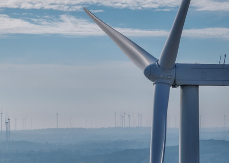 Wind energy. Wind power. Sustainable, renewable energy. Wind turbines generate electricity. Wind farm. Sustainable resources. Sustainable development. Green technology for energy sustainability.の写真素材