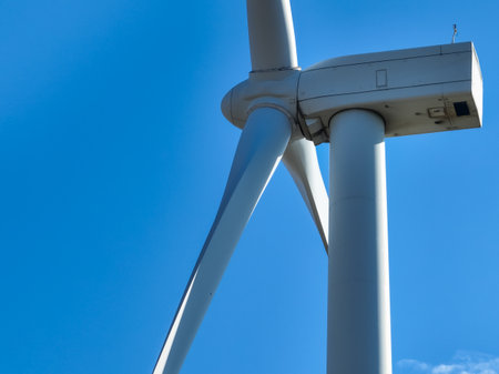 Wind energy and sustainable power generation with wind turbines, Eco-friendly solutions for renewable resources. Wind power farm and sustainable development of renewable energy, green technology.の写真素材